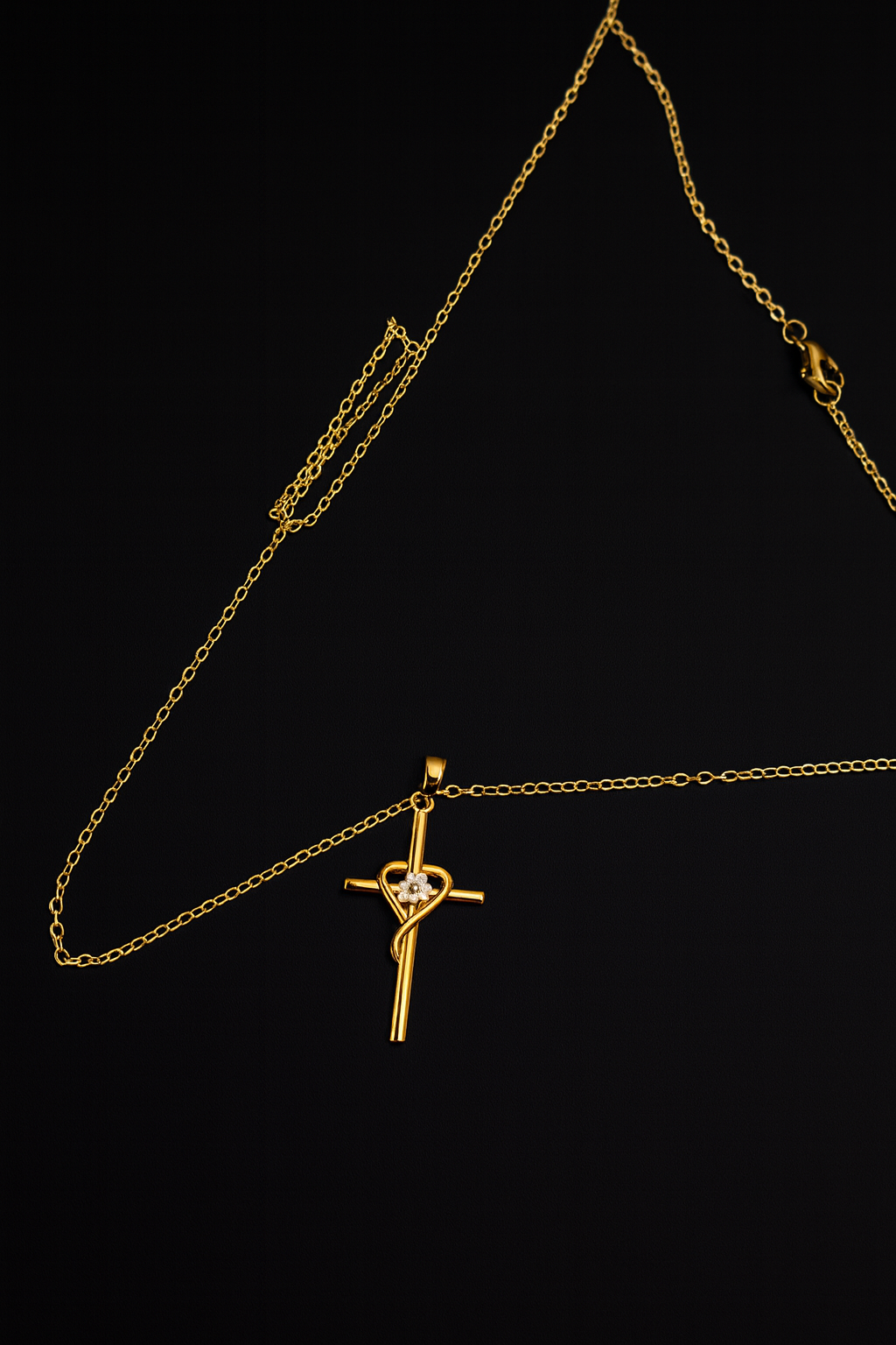 Cross intertwined with a heart neckless
